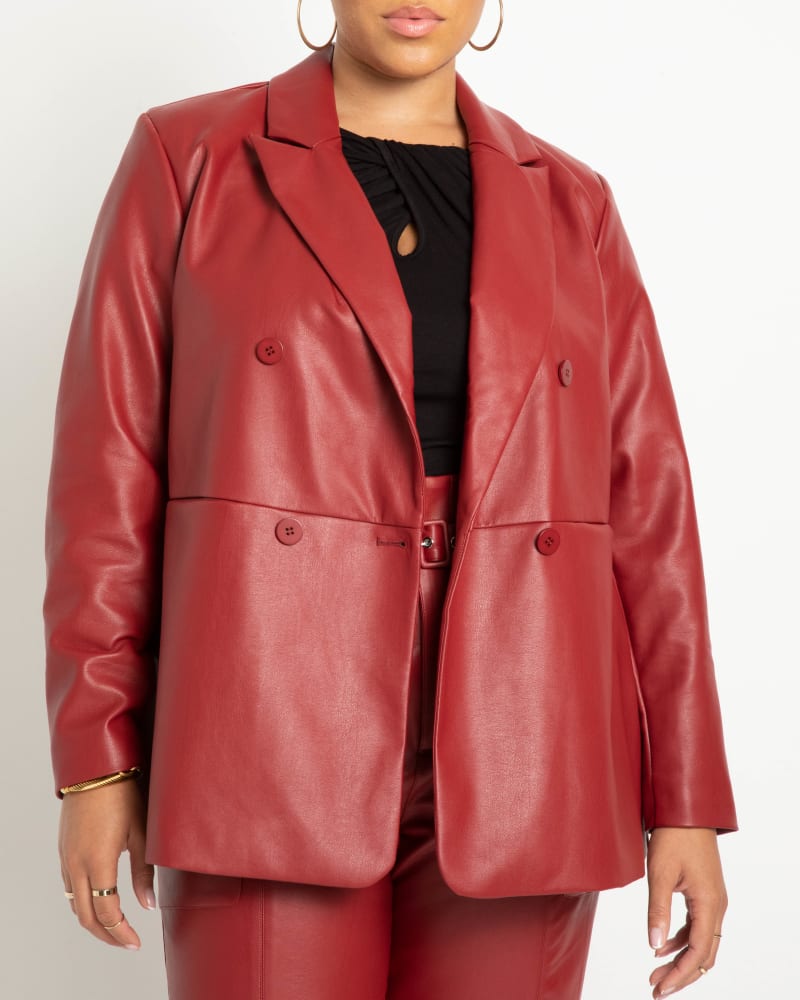 Front of a model wearing a size 14 Double Breasted Faux Leather Blazer in Biking Red by ELOQUII. | dia_product_style_image_id:231479